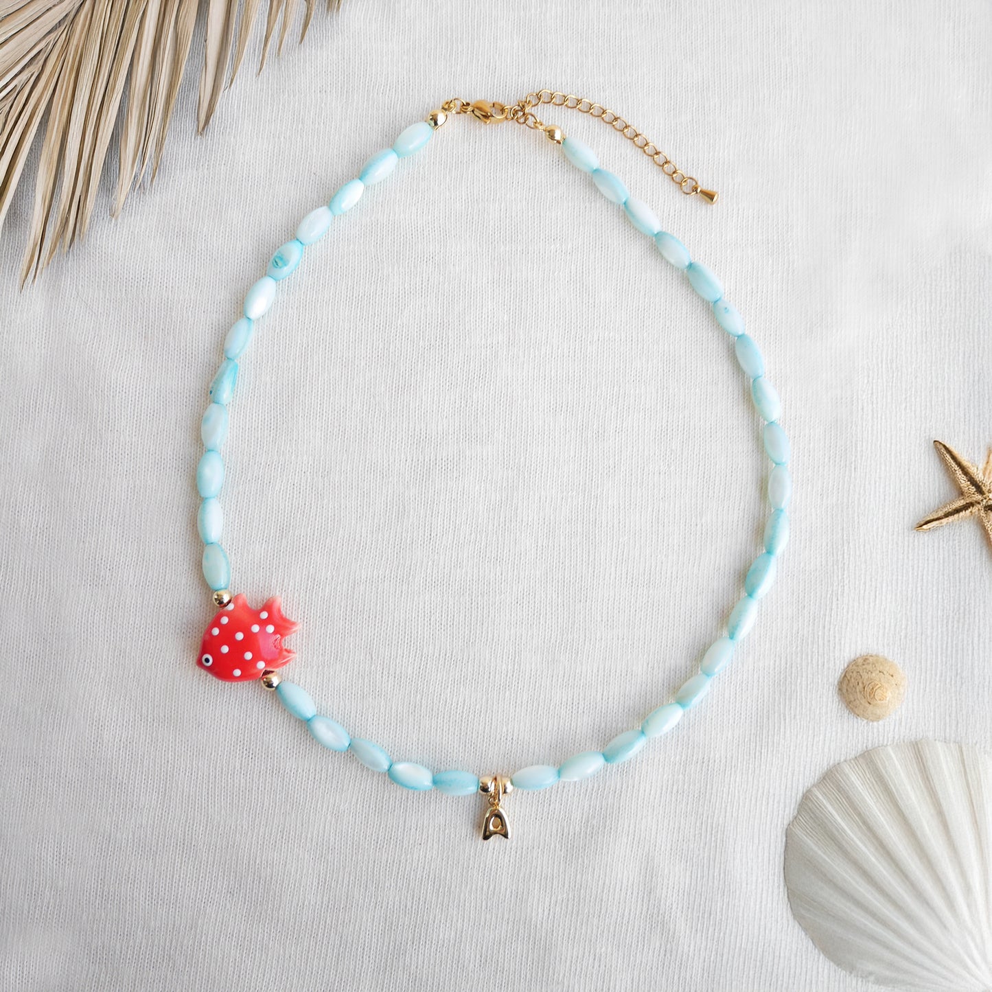 Colorful summer necklace – turquoise shell beads, red fish and bubble initial