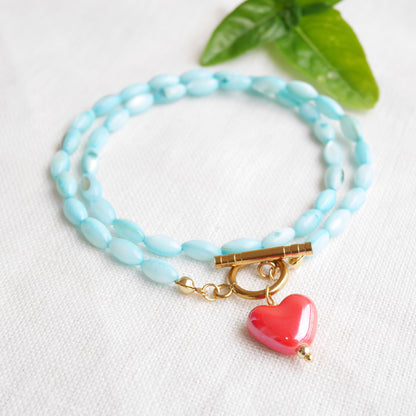 Turquoise shell bead necklace - red porcelain heart charm choker