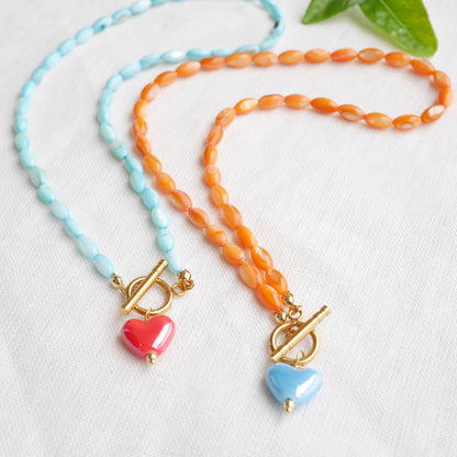 Turquoise shell bead necklace - red porcelain heart charm choker