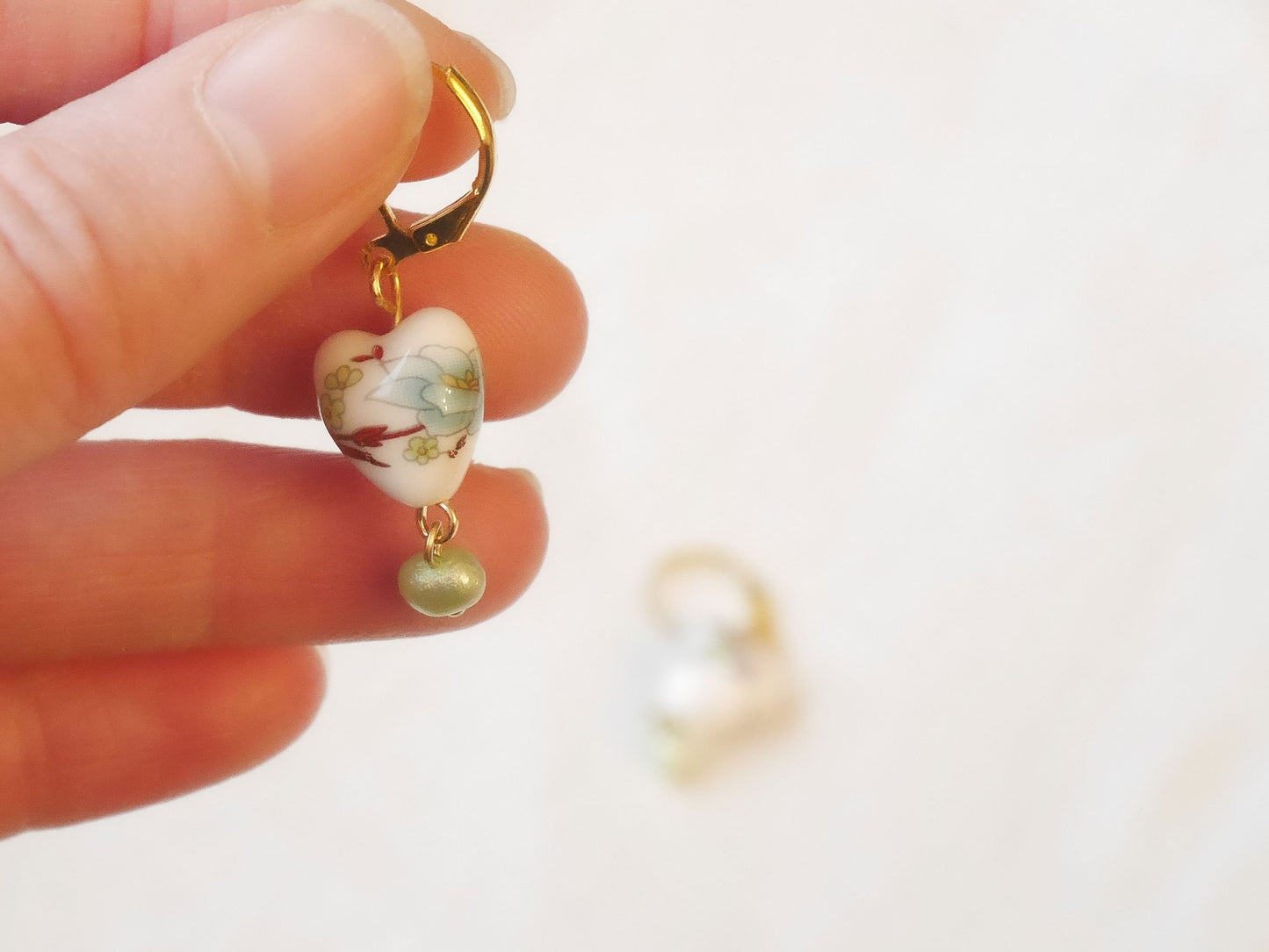 Dainty porcelain earrings | Ceramic heart earrings with light green freshwater pearl